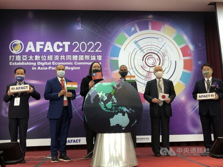 Minister Without Portfolio Audrey Tang (third left) attends a AFACT forum in Taipei on Monday. 