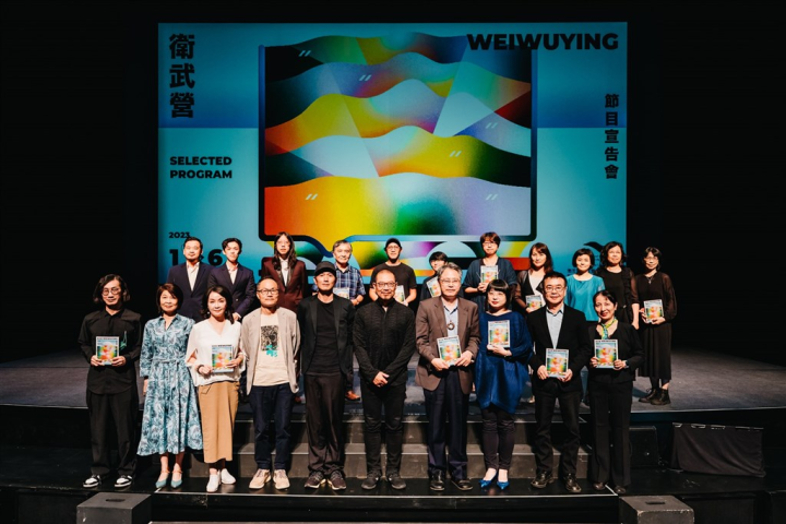 Weiwuying General and Artistic Director Chien Wen-pin (front row, fifth right) and representatives of groups in the programs the arts center produces are pictured at a news conference in Kaohsiung on Tuesday. Photo courtesy of Weiwuying
