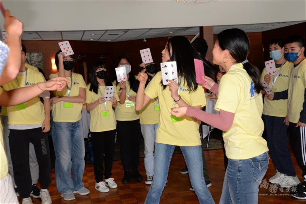 FASCA's new members can be seen wearing the organization's yellow uniform and participating in an ice-breaking activity.