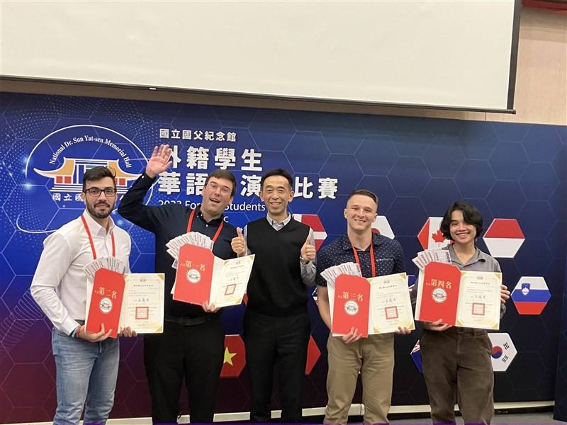 Contestants pose with their prizes and certificates at the 2023 Foreign Students Chinese Public Speaking Competition in Taipei on Tuesday.